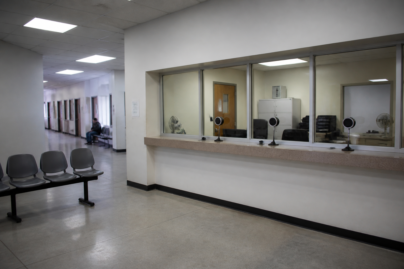 Government Reception Area with Glass Window and Microphones