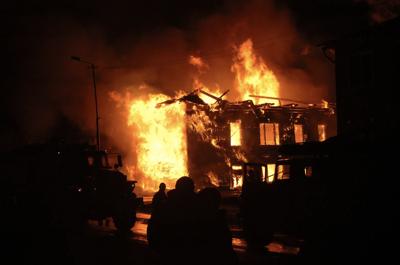 a house burning down as a result of an arsonist