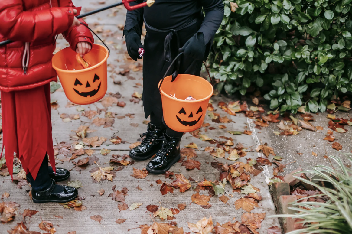 two Halloween trick or treaters