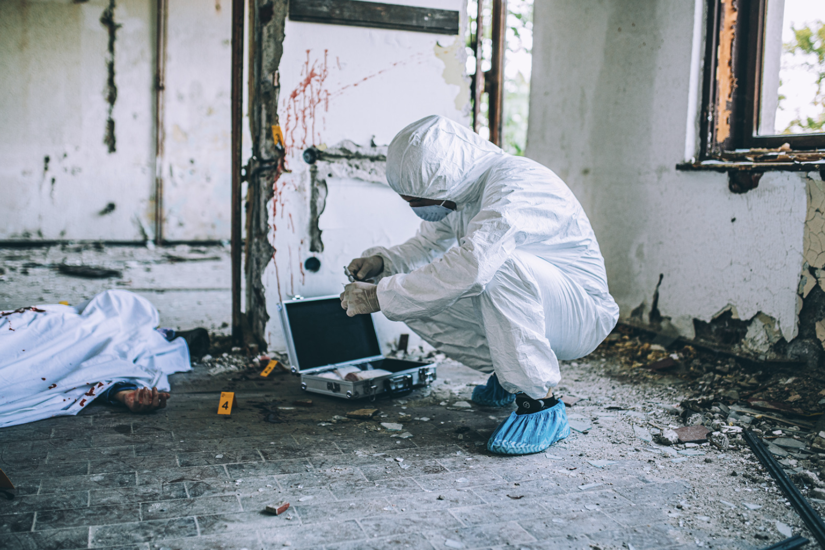 a coroner investigating a murder scene