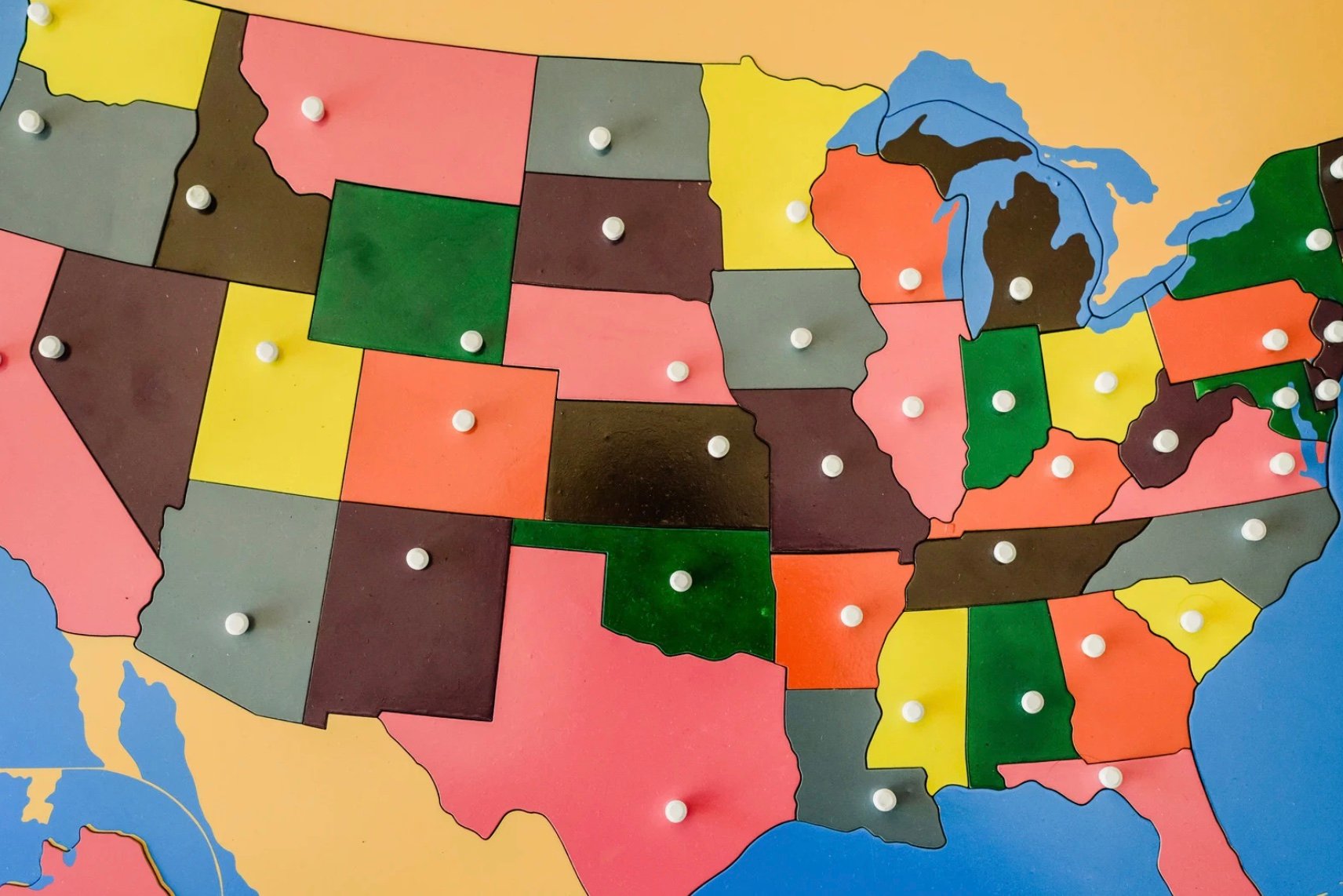 a wooden puzzle of the United States