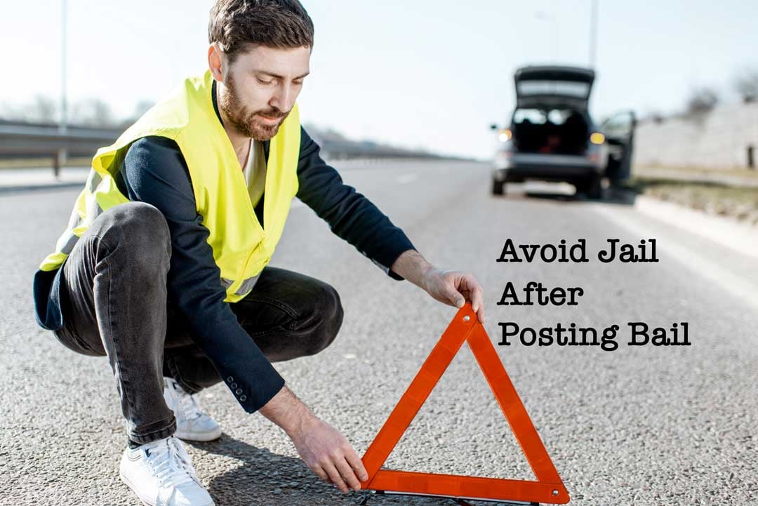 man setting up traffic cone