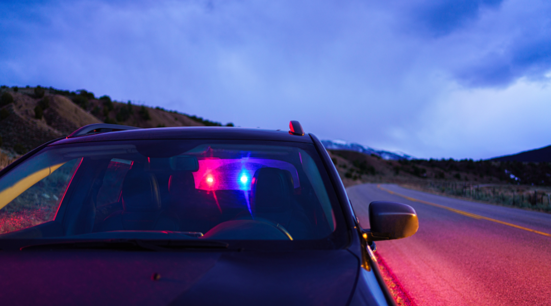 cop car pulling someone over