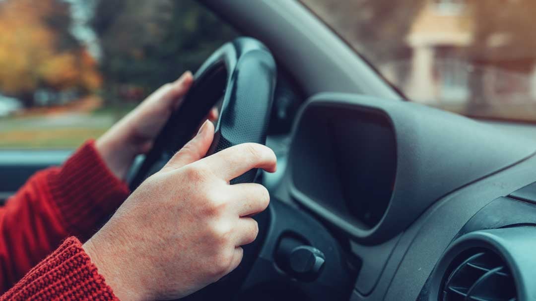 hands on steering wheel