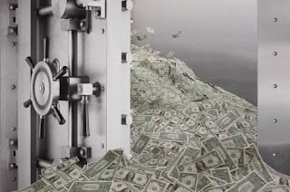 dollar bills in a safe