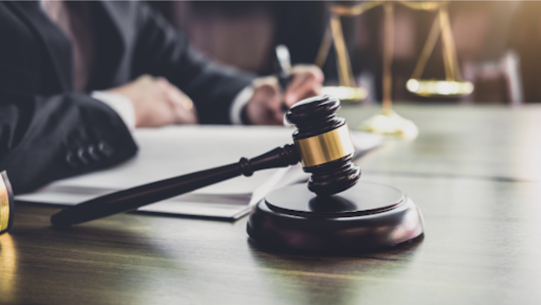 A gavel laying on a table