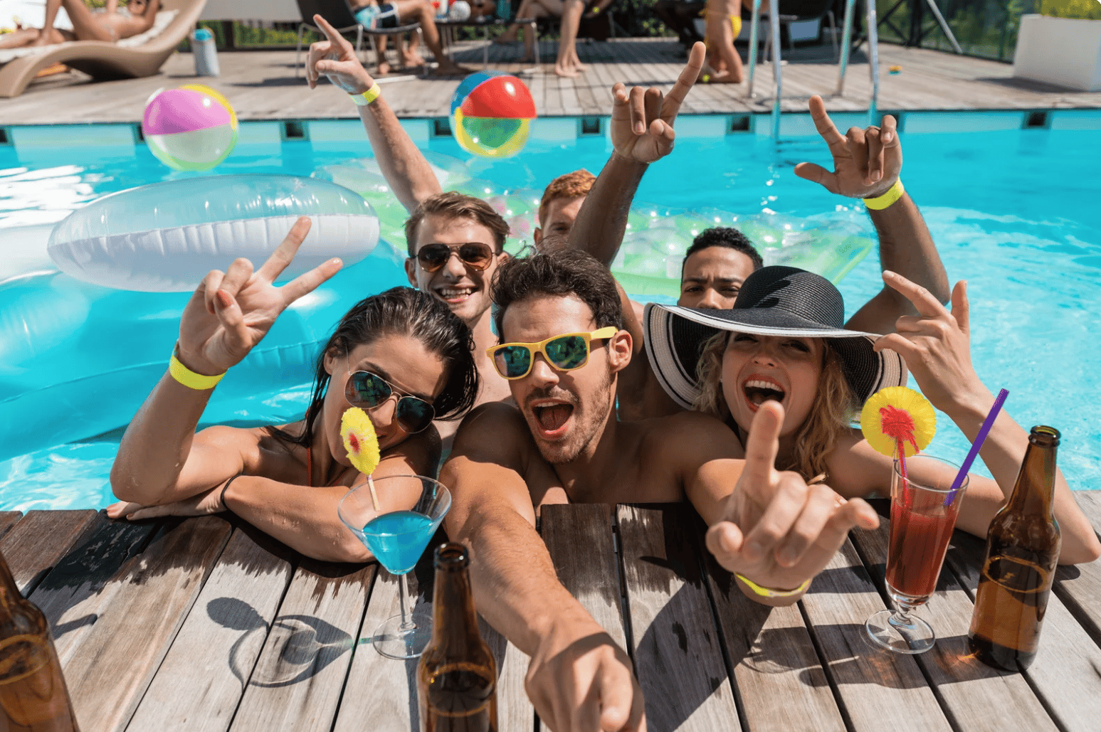 a group of people in the pool partying