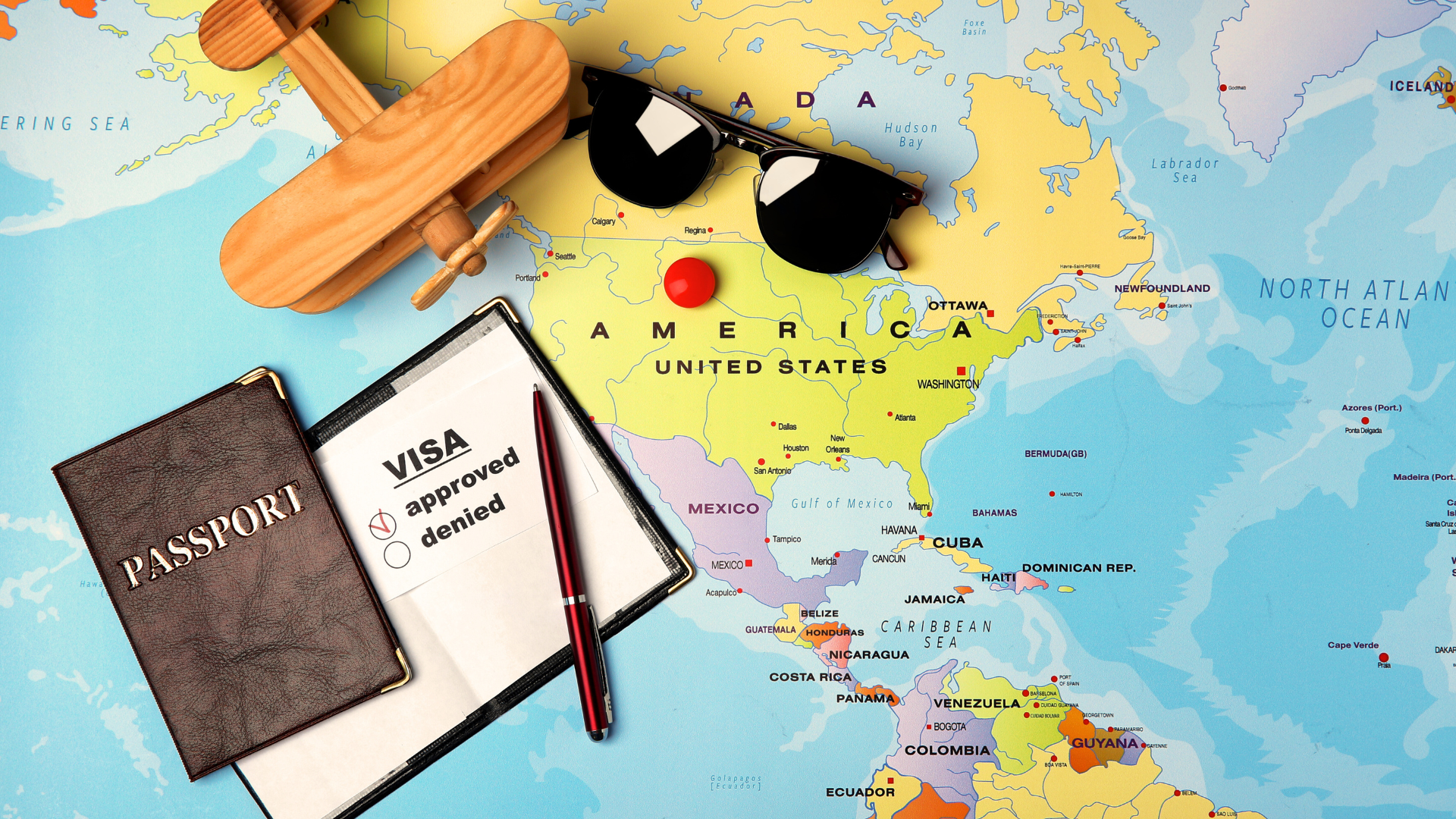 map of America with passport on top